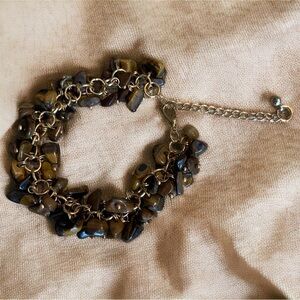 Multi stone tigers eye bracelet. Gold tone.